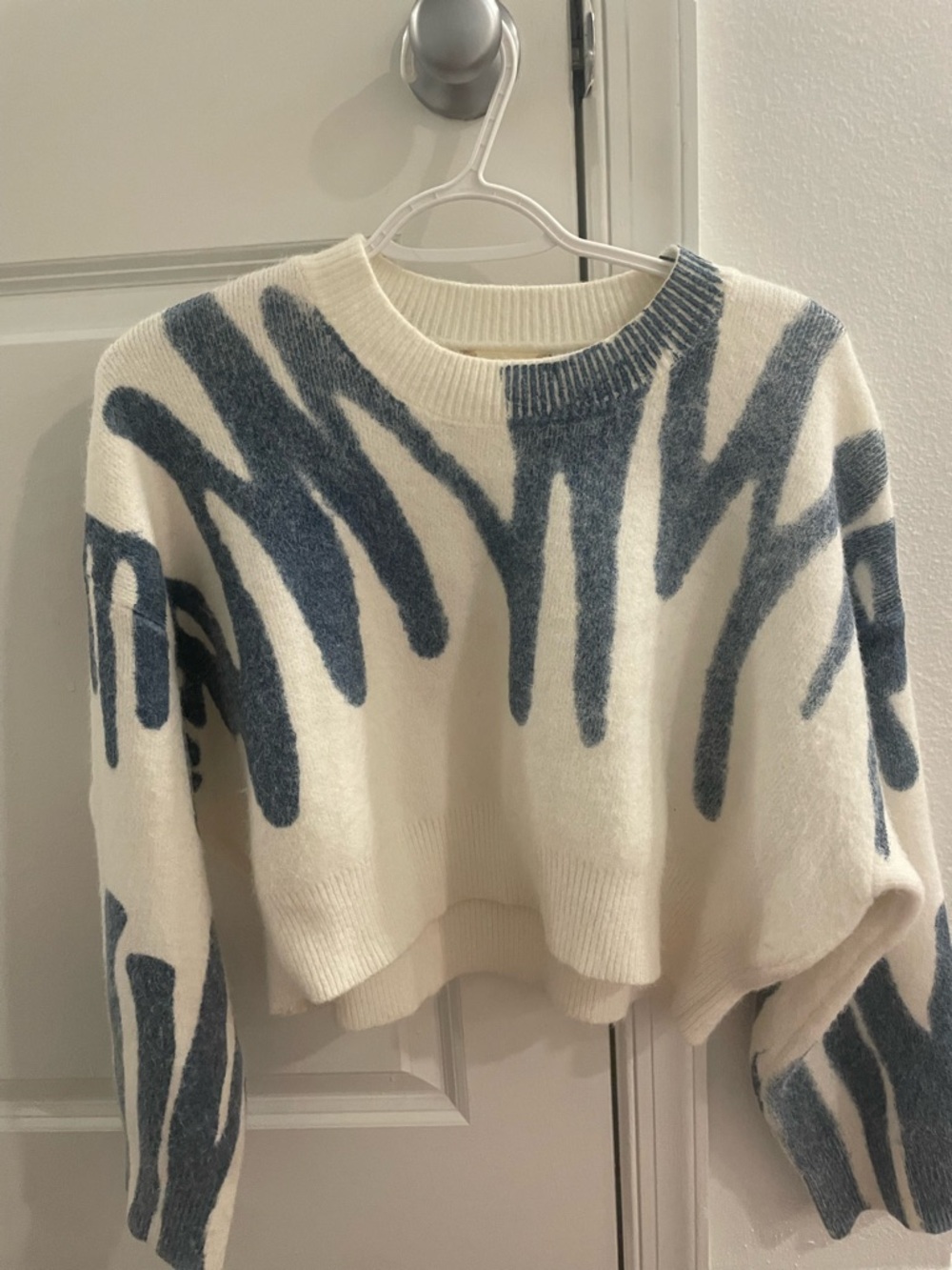 Altar'd State Cream Sweater with Blue Abstract Brushstroke Pattern